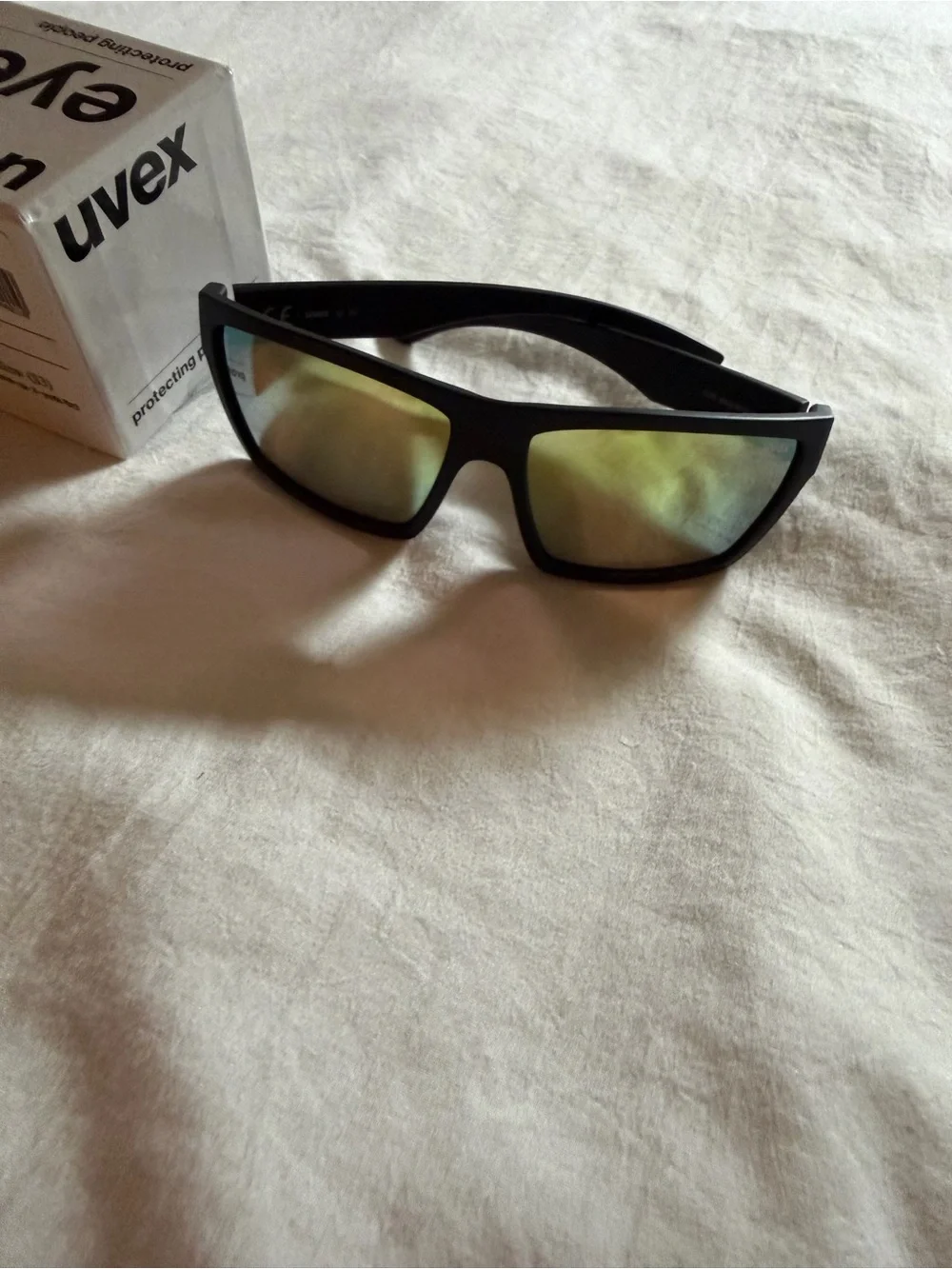 Uvex Black Matte Sunglasses with Yellow Mirror Lenses
